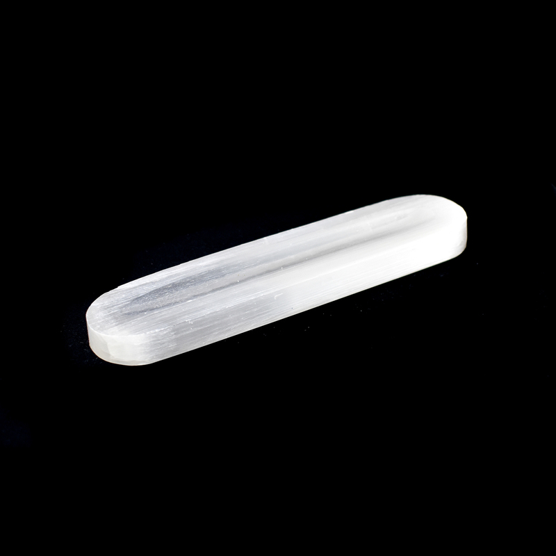 Selenite bar with rounded edges and groove down the middle.